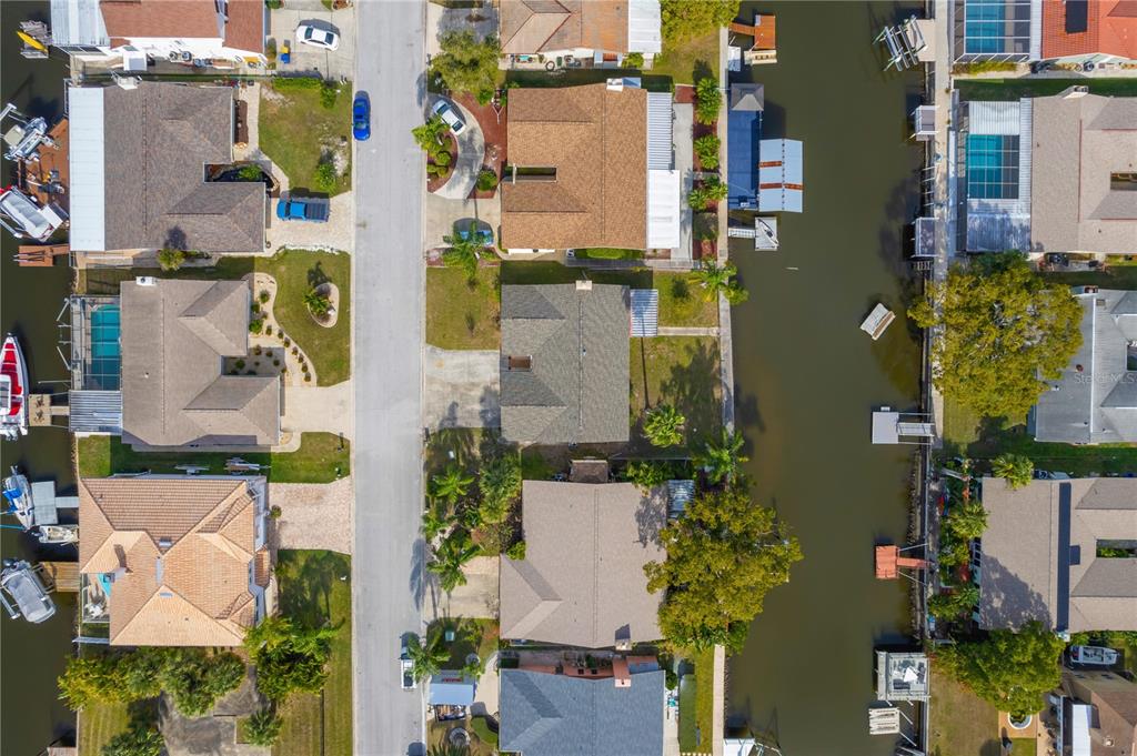 9840 San Sebastian Way Port Richey, FL 34668 - Photo 39 of 45 aerial view of residential houses and outdoor space