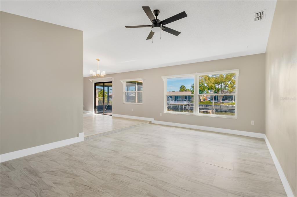 9840 San Sebastian Way Port Richey, FL 34668 - Photo 8 of 45 a view of an empty room with a window