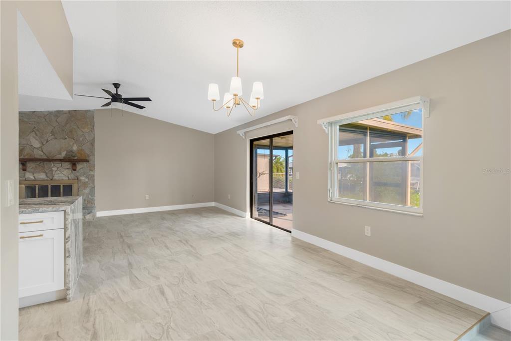9840 San Sebastian Way Port Richey, FL 34668 - Photo 10 of 45 a view of an empty room with a window