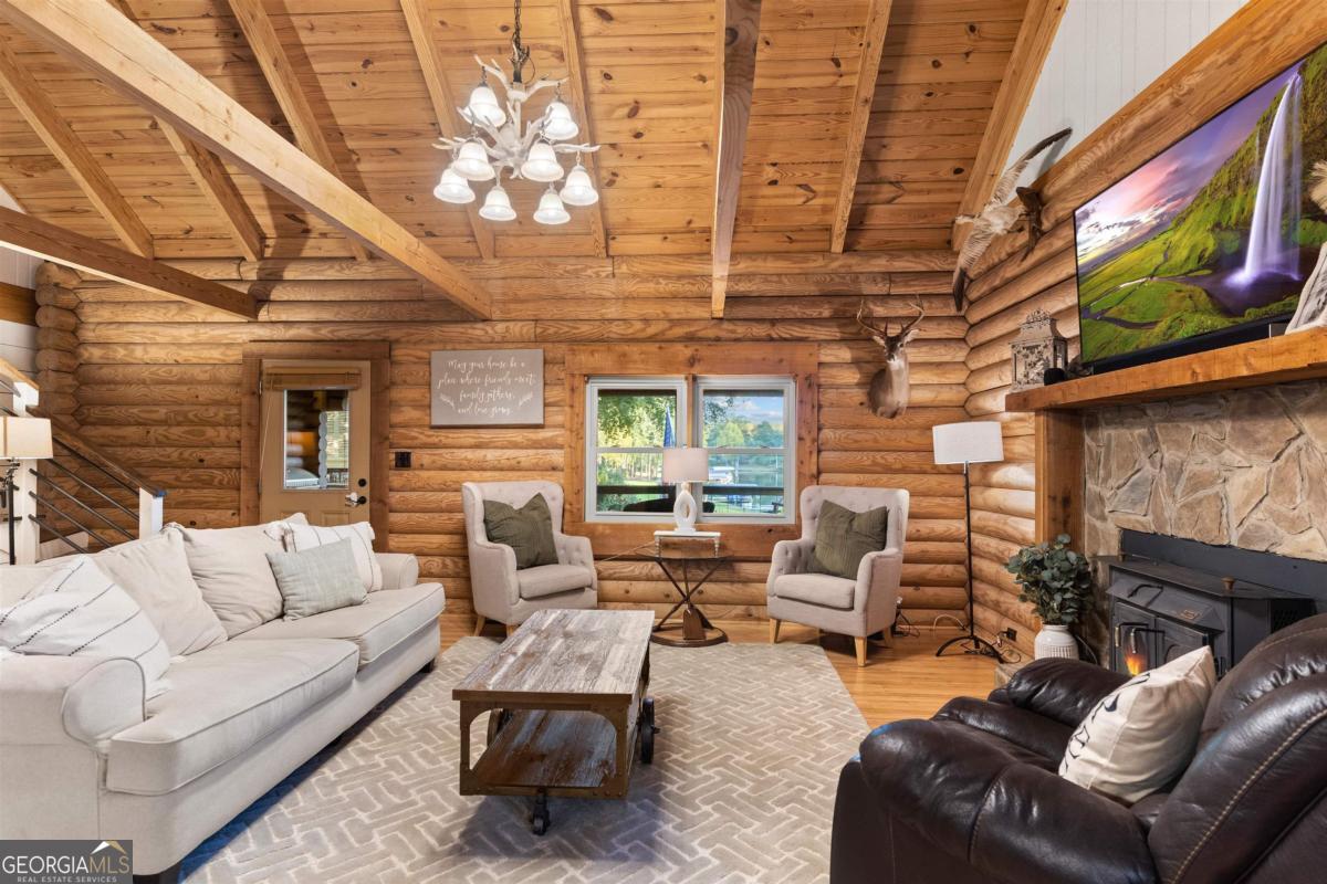 224 Loch Way Eatonton, GA 31024 - Photo 16 of 59 a building outdoor space with patio furniture