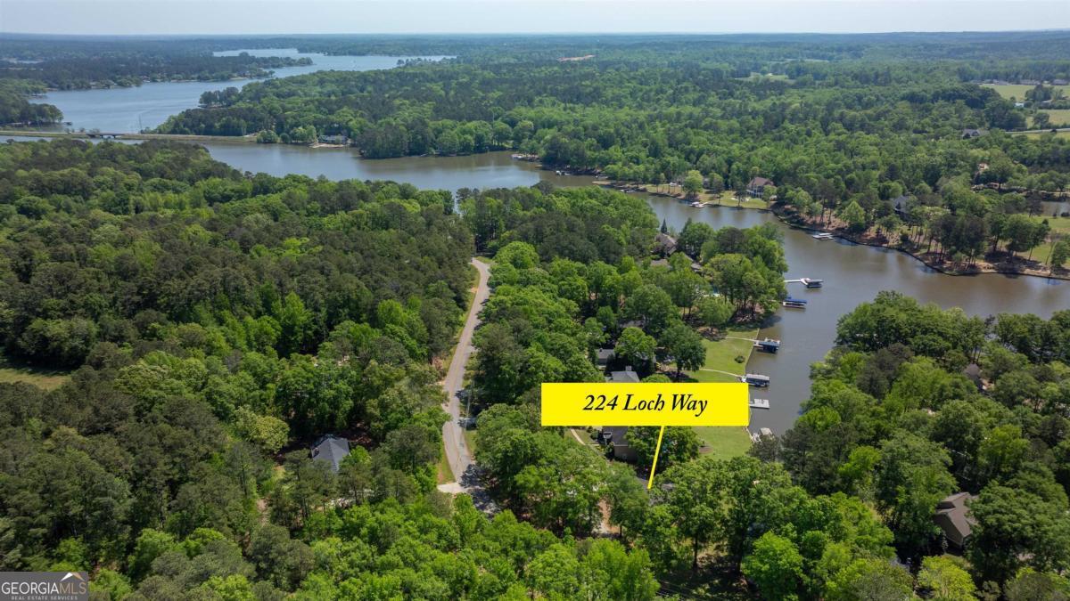 224 Loch Way Eatonton, GA 31024 - Photo 55 of 59 an aerial view of a house with a yard