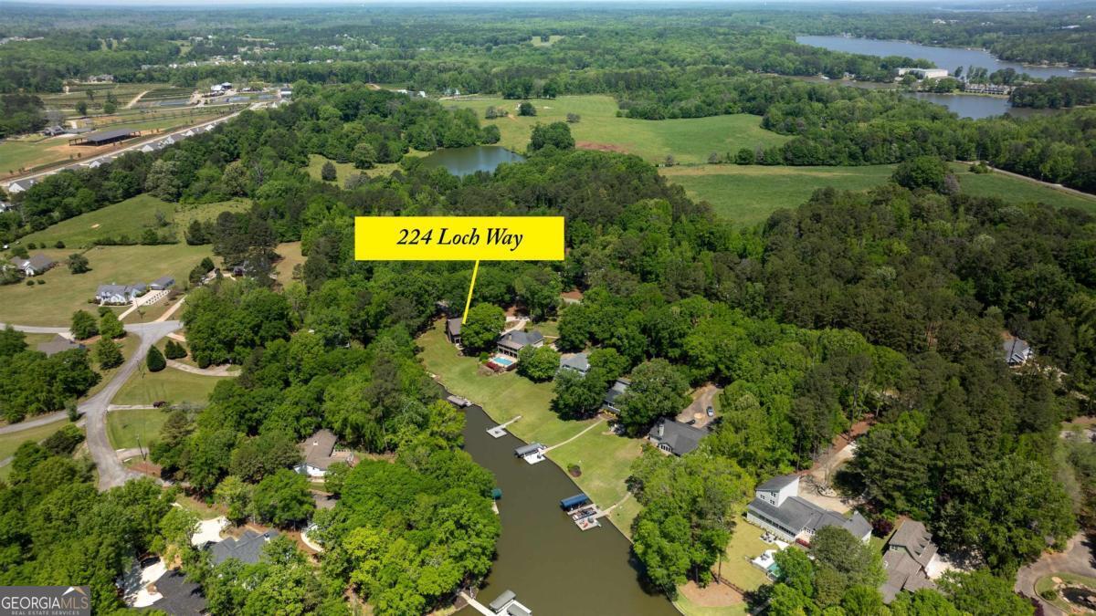 224 Loch Way Eatonton, GA 31024 - Photo 58 of 59 an aerial view of a residential houses with outdoor space and trees