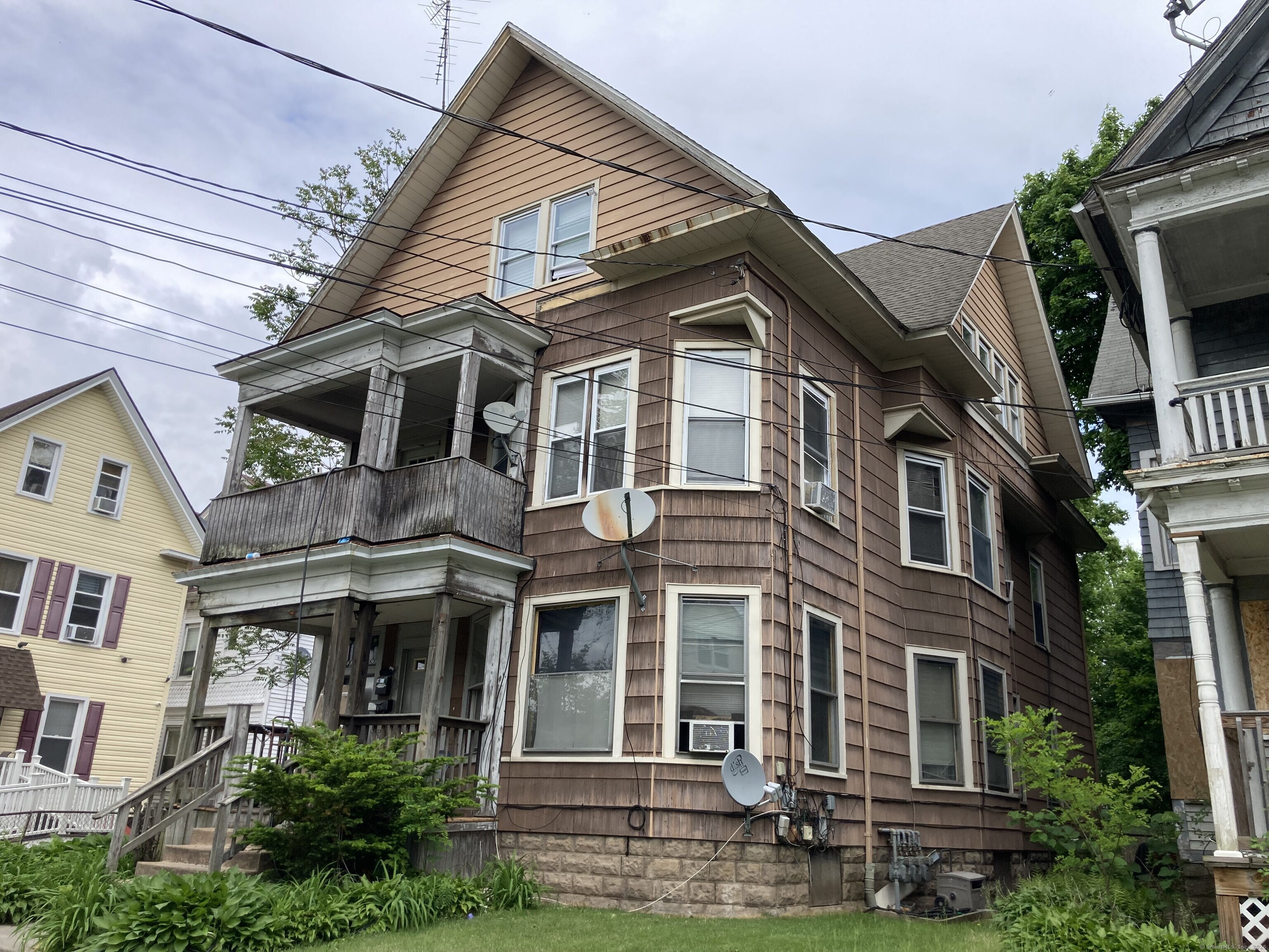 225 Winthrop Avenue New Haven, CT 06511 - Photo 1 of 36 a front view of a house with balcony