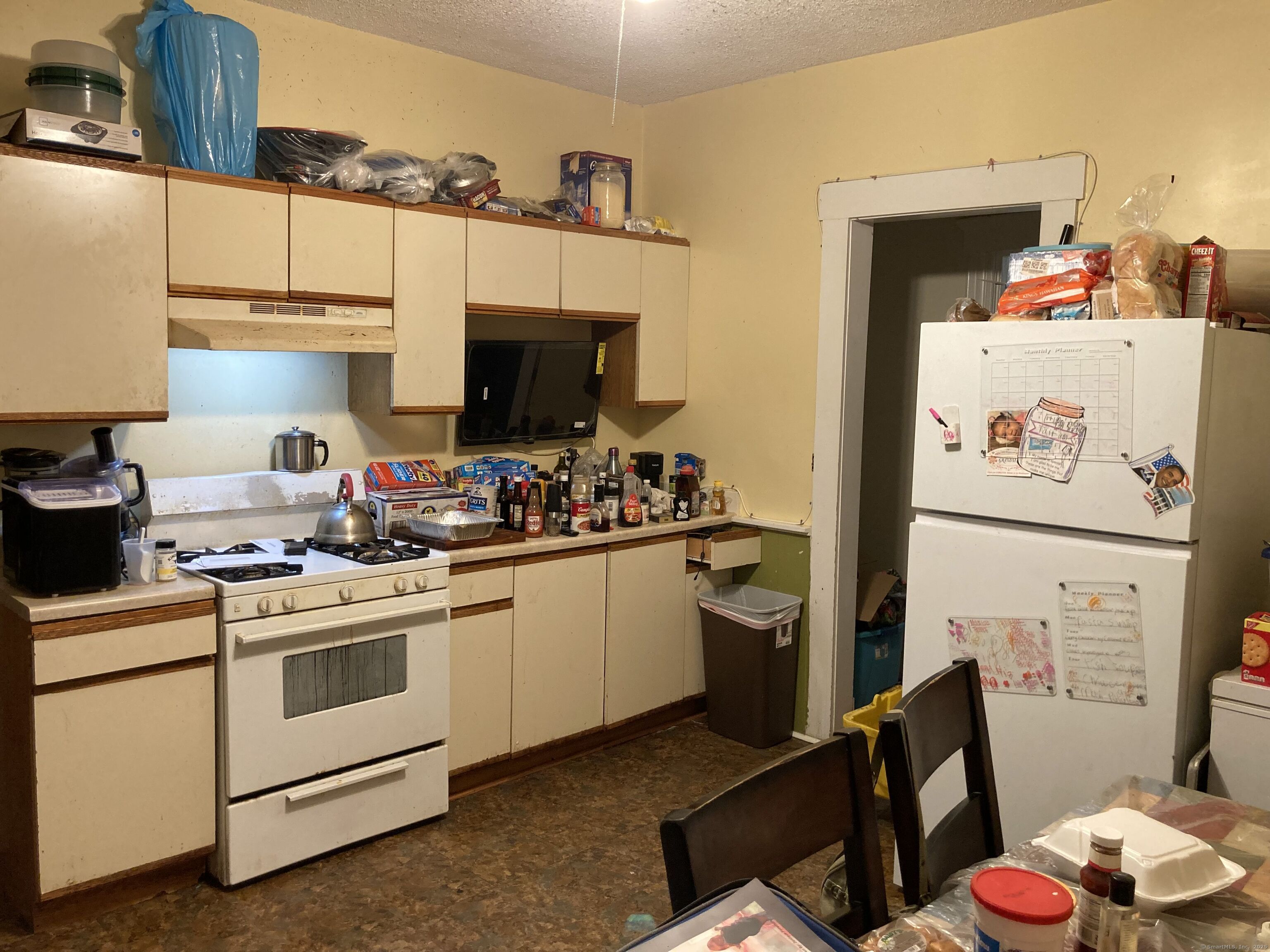 225 Winthrop Avenue New Haven, CT 06511 - Photo 19 of 36 a kitchen with stainless steel appliances a white stove top oven and a refrigerator