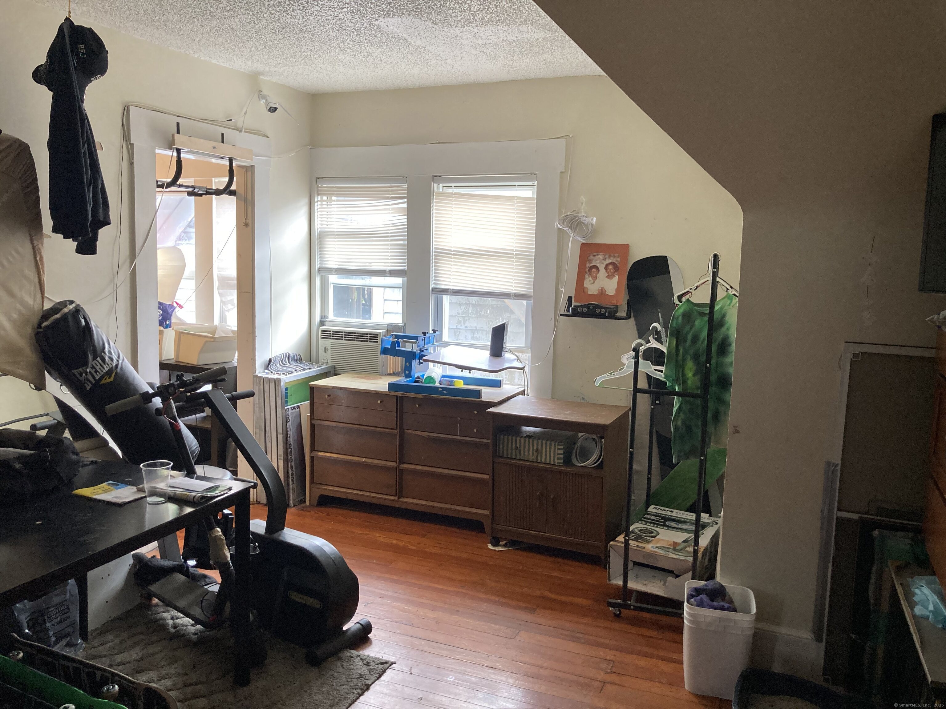 225 Winthrop Avenue New Haven, CT 06511 - Photo 24 of 36 a room with furniture a flat screen tv and a window