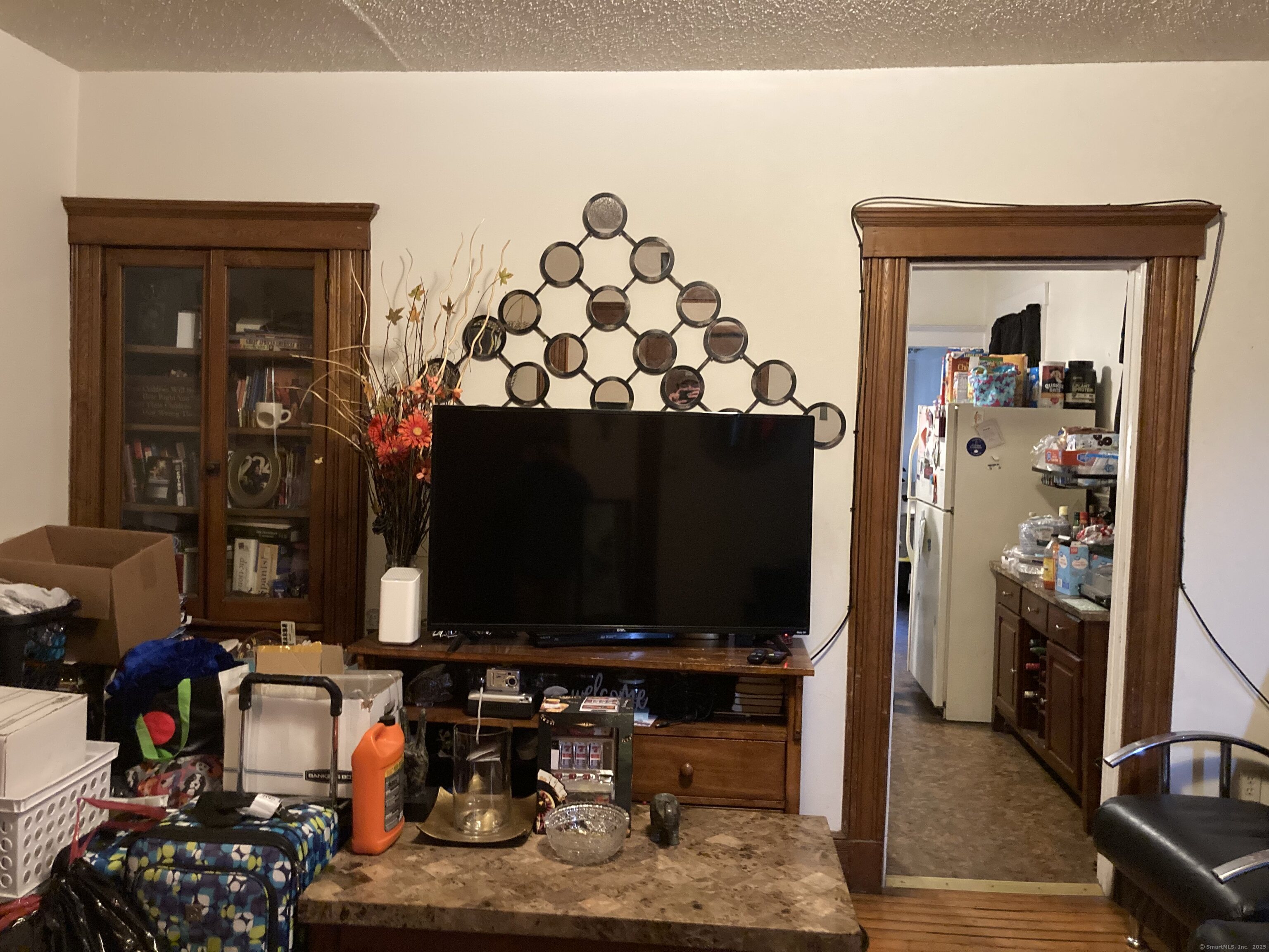 225 Winthrop Avenue New Haven, CT 06511 - Photo 6 of 36 a living room with lots of different furniture and a flat screen tv