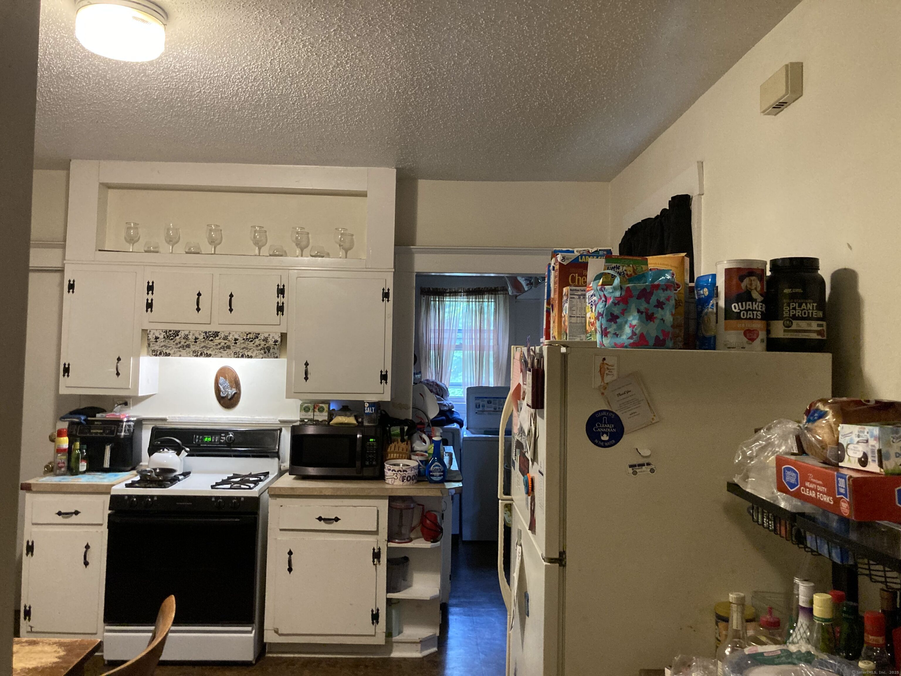 225 Winthrop Avenue New Haven, CT 06511 - Photo 7 of 36 a view of a workspace with furniture and wooden floor