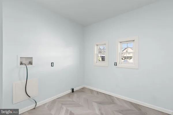 a view of a room with rack on the wall