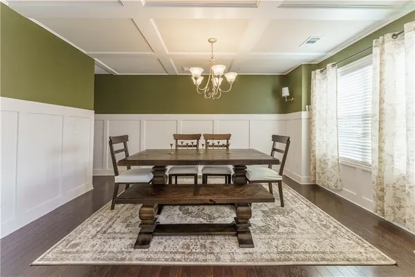 a view of a dining room with furniture