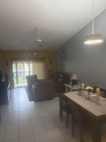 a kitchen with a sink cabinets and appliances