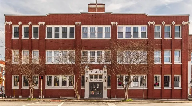 a front view of a multi story building