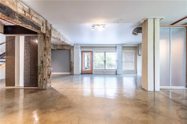 a view of gallery with windows