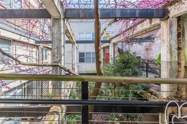 a view of a lake with a couple of people