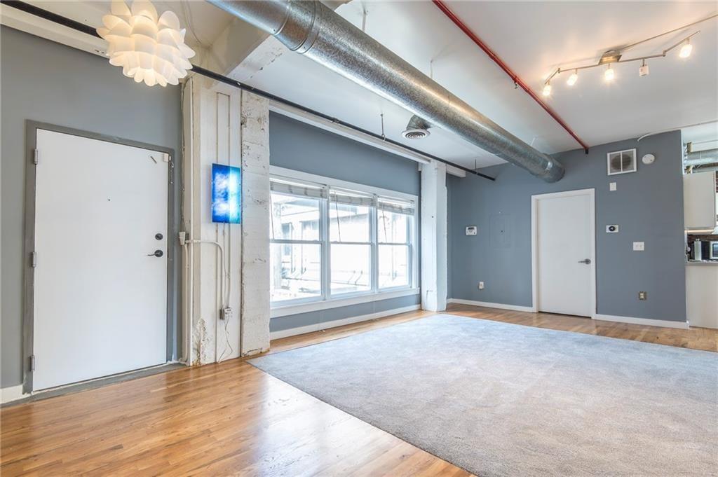 244 Peters Street Southwest, Unit 10 Atlanta, GA 30313 - Photo 6 of 38 a view of an empty room with a window