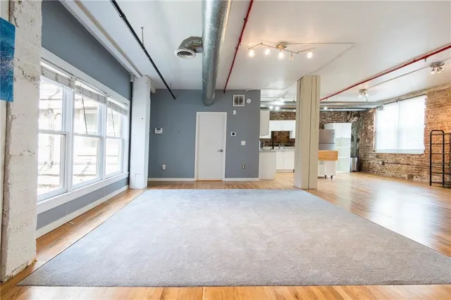 a view of an empty room with a window