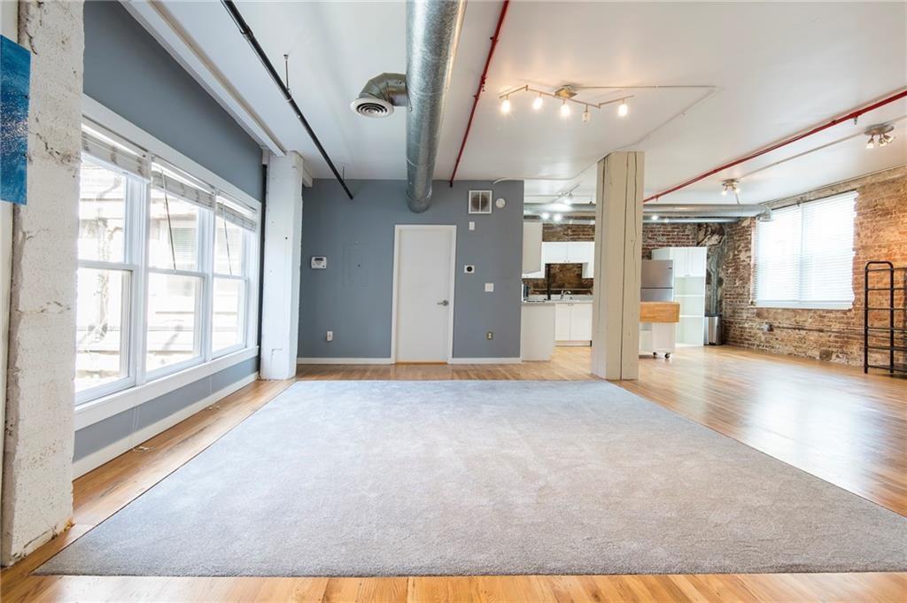 244 Peters Street Southwest, Unit 10 Atlanta, GA 30313 - Photo 7 of 38 a view of an empty room with a window