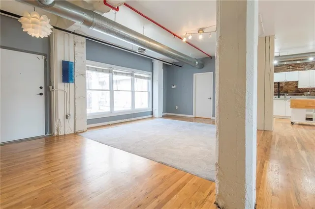 a view of an empty room and window