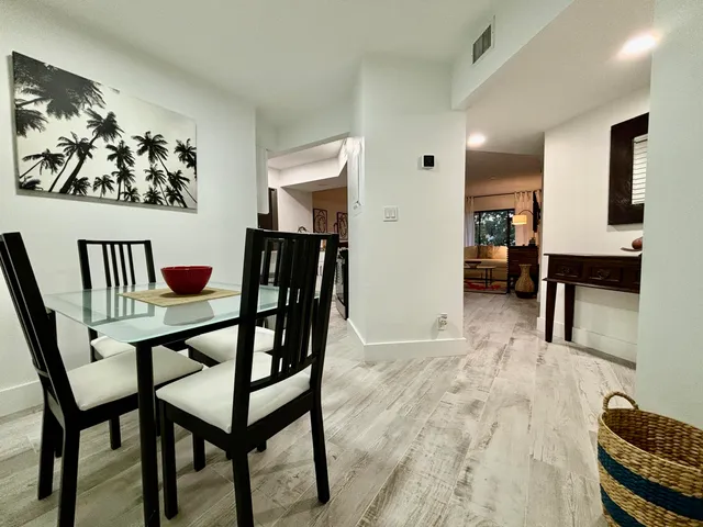 a view of a livingroom with furniture and a couch