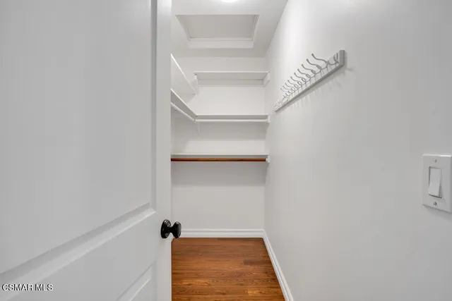 a view of an empty walk in closet