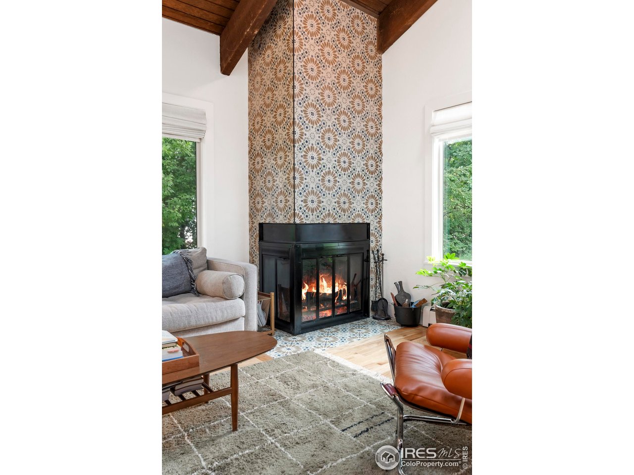 2589 Alkire Street Golden, CO 80401 - Photo 14 of 50 a living room with furniture and a fireplace