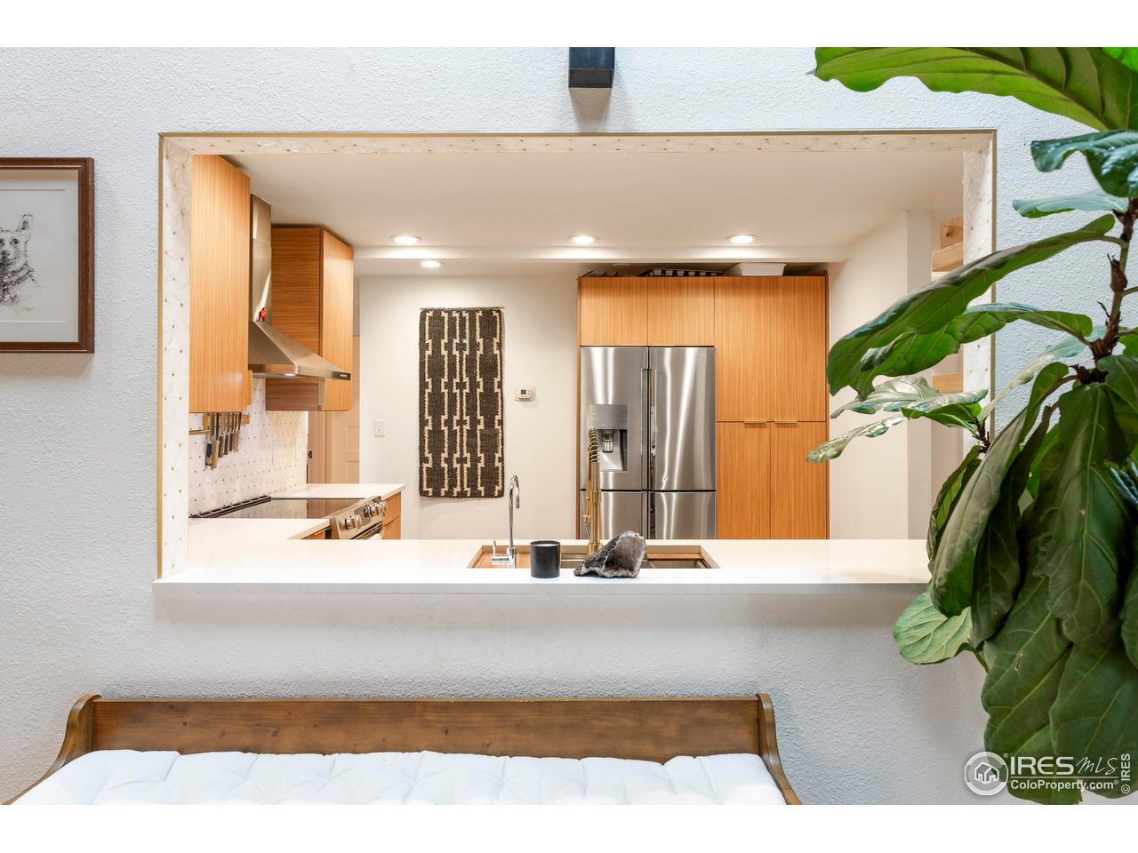 2589 Alkire Street Golden, CO 80401 - Photo 18 of 50 a living room with a rug