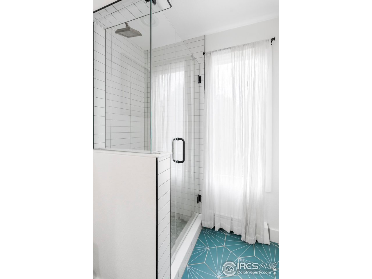 2589 Alkire Street Golden, CO 80401 - Photo 26 of 50 a bathroom with a shower and a toilet