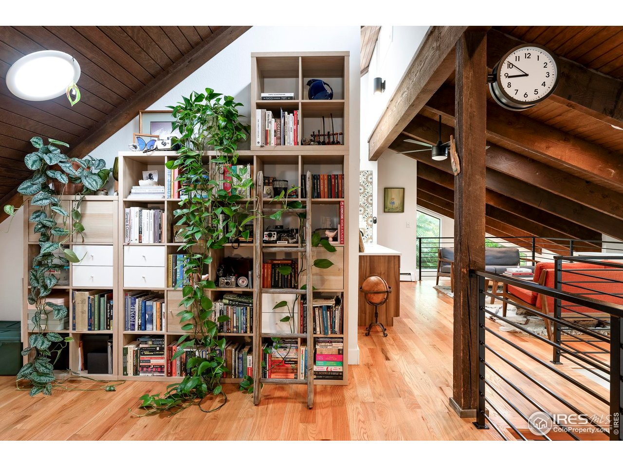 2589 Alkire Street Golden, CO 80401 - Photo 33 of 50 a view of living room with wooden floor and seating space