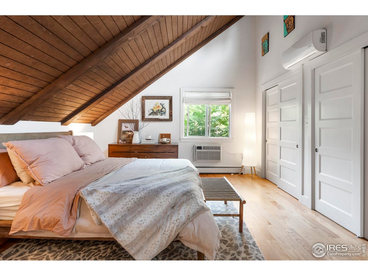 2589 Alkire Street Golden, CO 80401 - Photo 37 of 50 a bedroom with a bed and a window