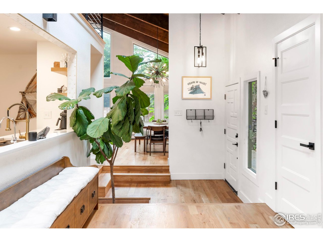 2589 Alkire Street Golden, CO 80401 - Photo 7 of 50 a living room with furniture and a potted plant