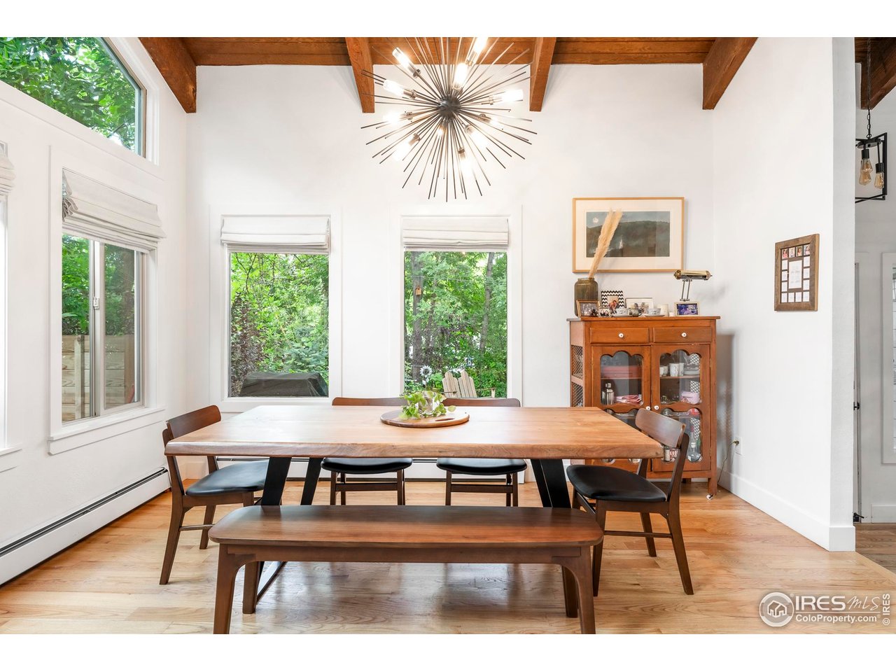 2589 Alkire Street Golden, CO 80401 - Photo 9 of 50 a dining room with furniture and window