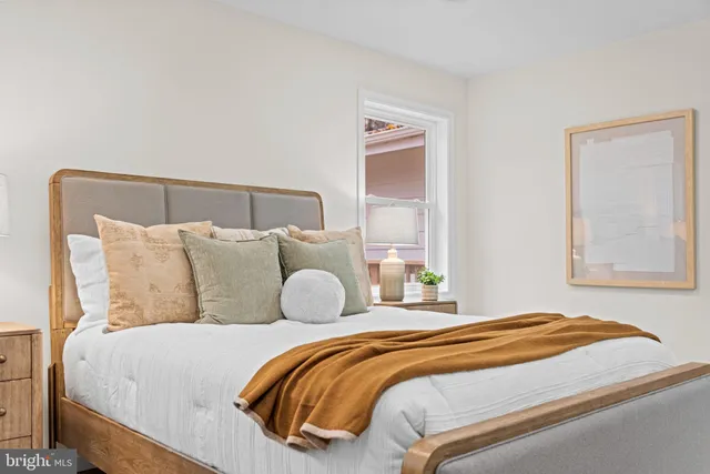 a bathroom with a bathtub a shower and a sink