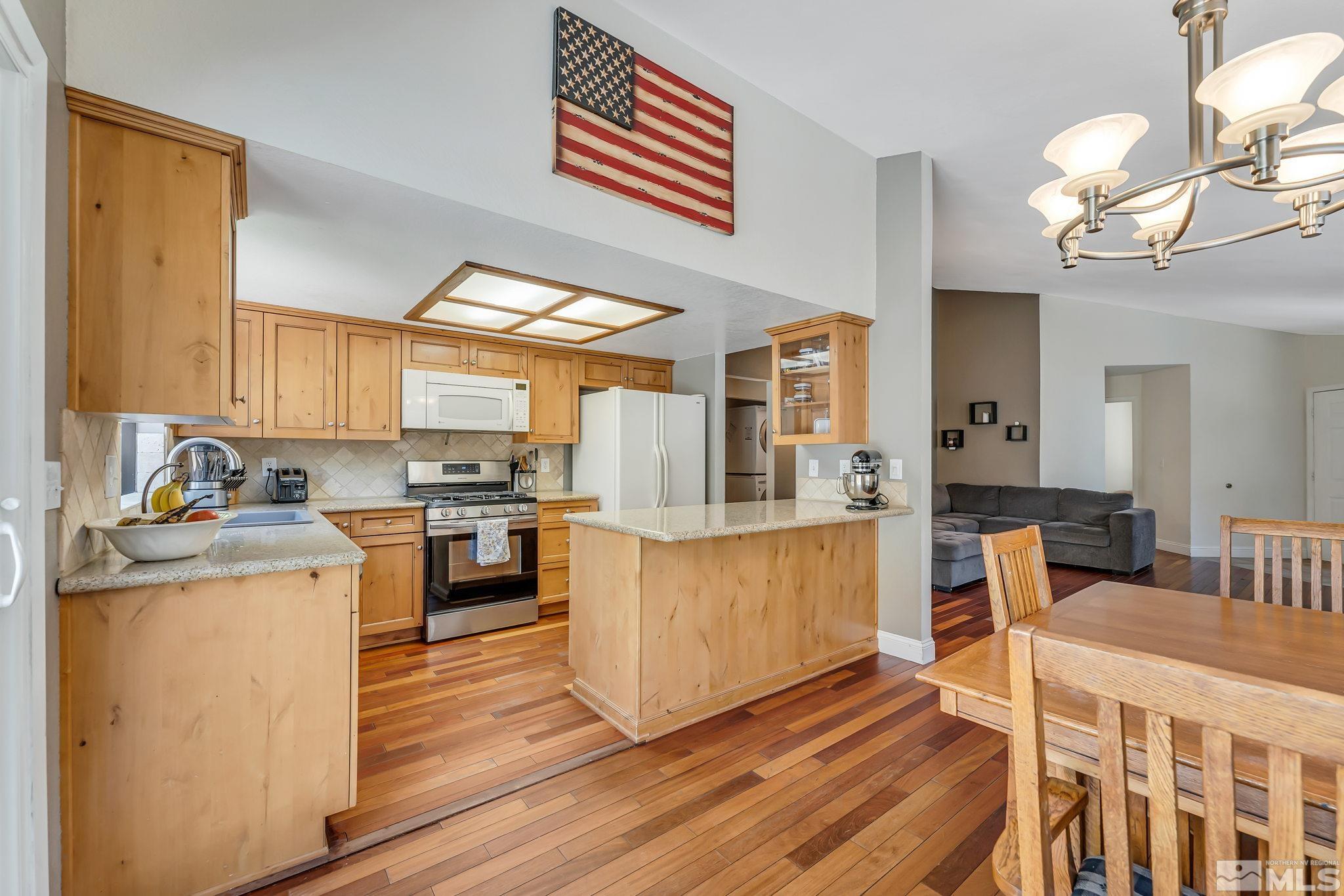 1802 Grand Point Way Reno, NV 89523 - Photo 5 of 19 a kitchen with a sink cabinets and window