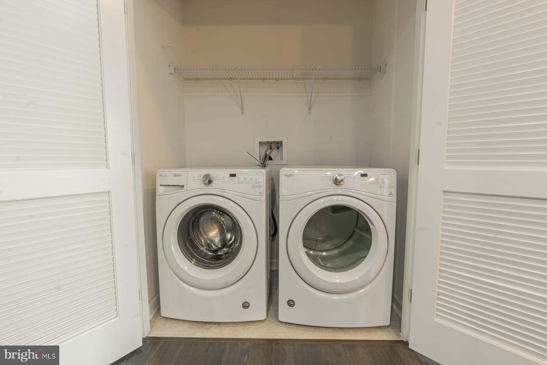 48 Heals Farm Road Burlington, NJ 08016 - Photo 27 of 59 Washer & Dryer storage beside Powder room