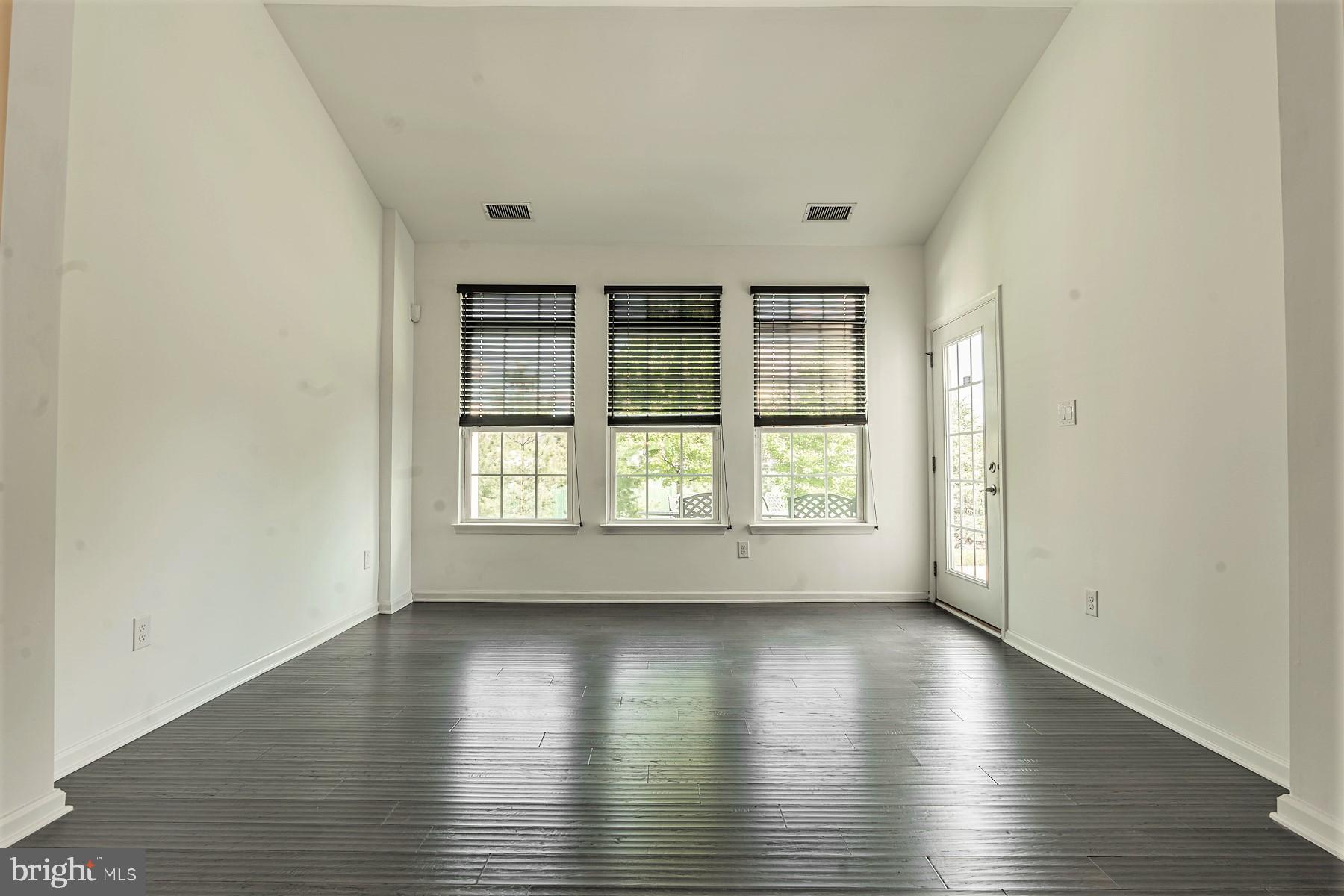 48 Heals Farm Road Burlington, NJ 08016 - Photo 6 of 59 Living room towards door to back patio