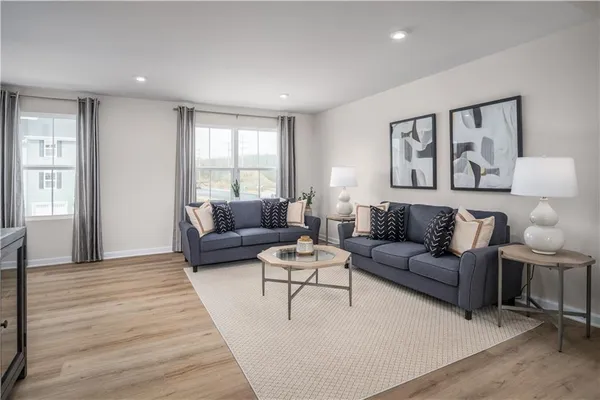 a living room with furniture and a couch
