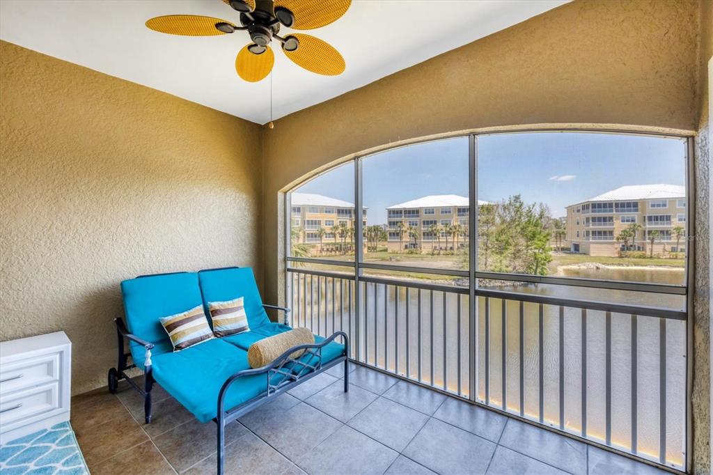 10720 Lemon Creek Loop, Unit 103 Englewood, FL 34224 - Photo 24 of 50 a bedroom with furniture and a window