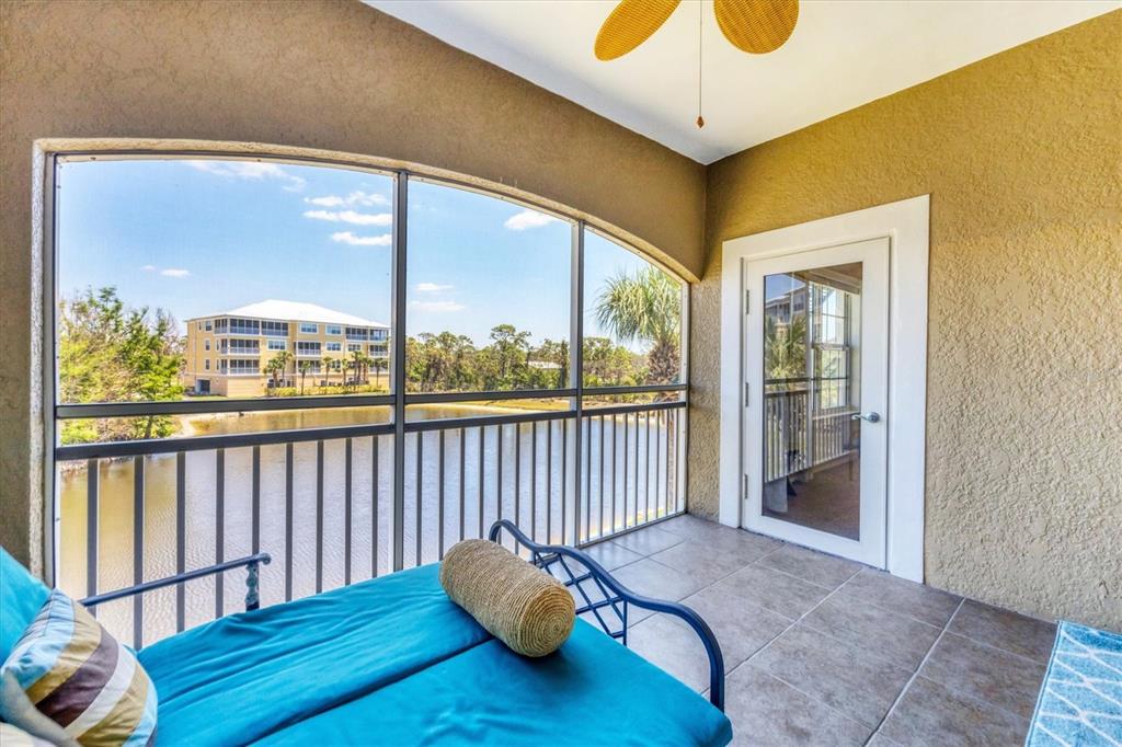 10720 Lemon Creek Loop, Unit 103 Englewood, FL 34224 - Photo 25 of 50 a view of a living room and a window