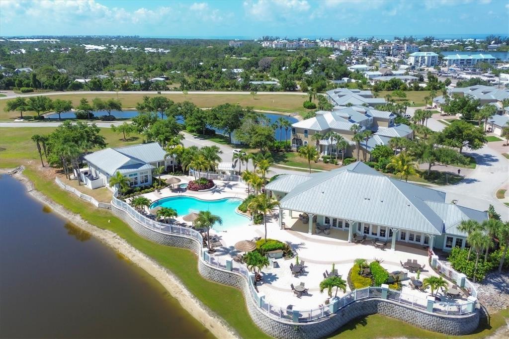 10720 Lemon Creek Loop, Unit 103 Englewood, FL 34224 - Photo 47 of 50 an aerial view of a house with yard swimming pool and outdoor seating