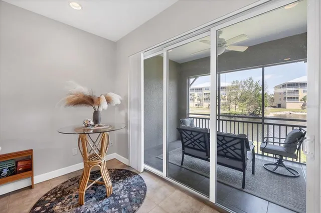 a view of entryway with wooden floor and windows
