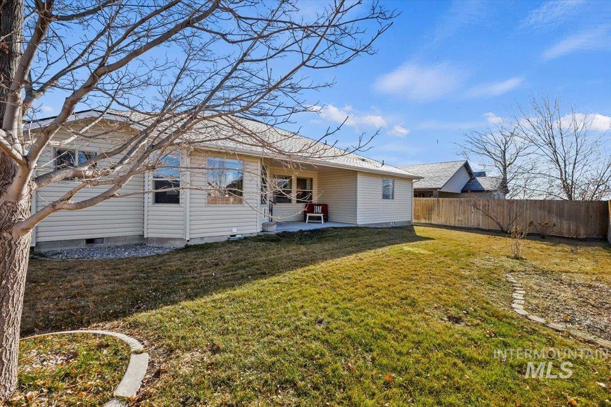 657 Creekside Way Twin Falls, ID 83301 - Photo 31 of 45 Back of property with a patio area and crawl space