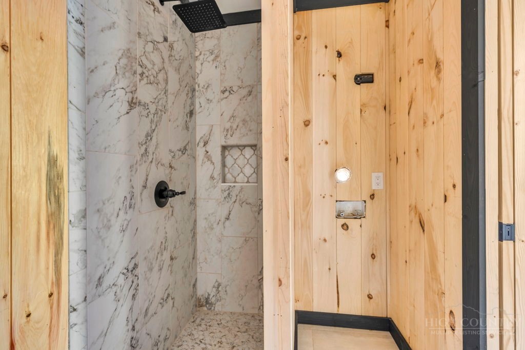 209 Meadow Loop Newland, NC 28657 - Photo 14 of 30 a bathroom with a shower