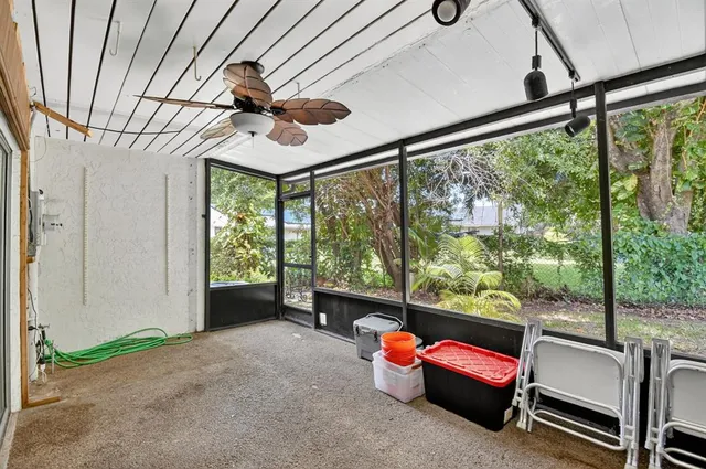 a view of a porch with seating space