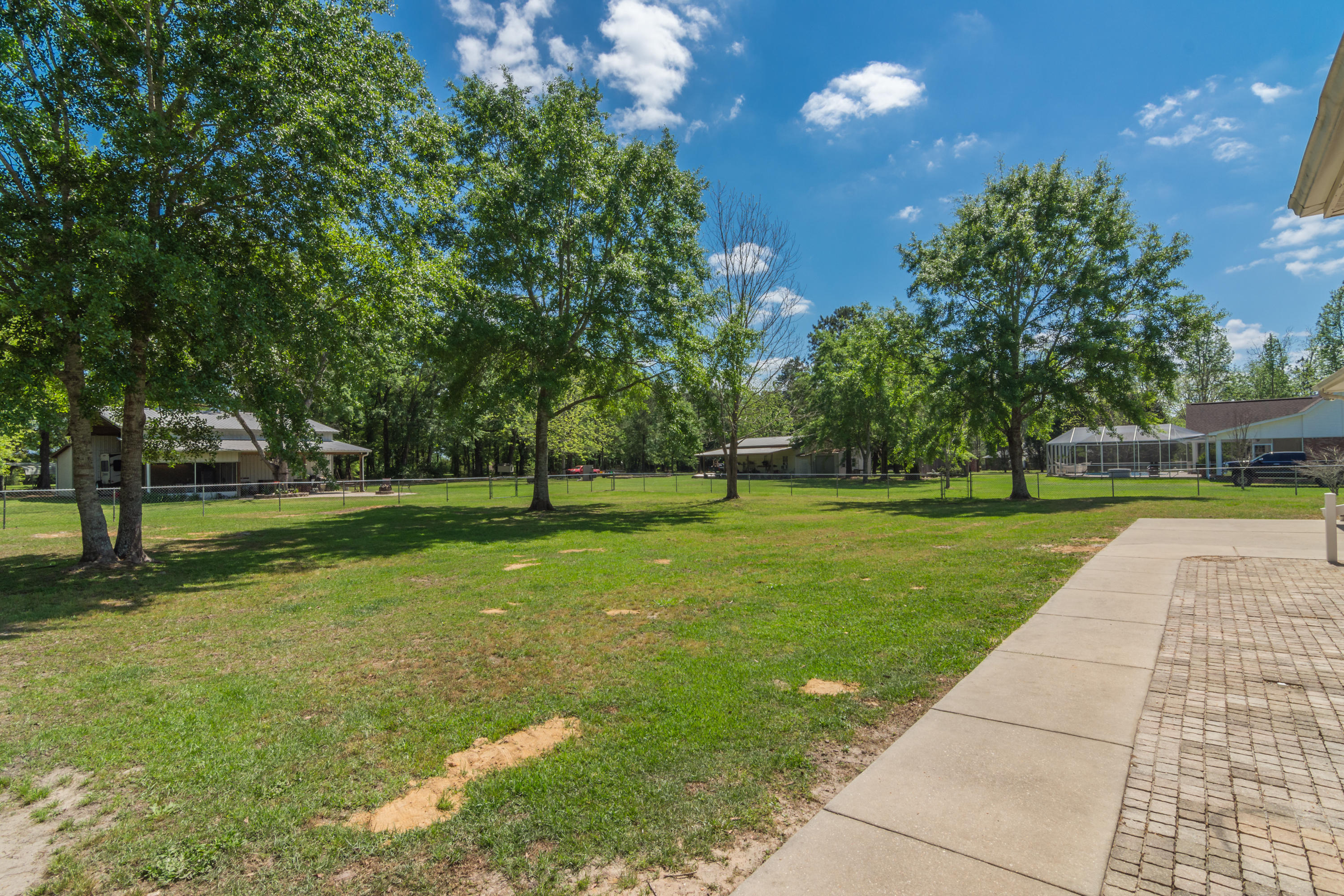 5995 Jack Stokes Road Baker, FL 32531 - Photo 11 of 60 a view of a park with large trees