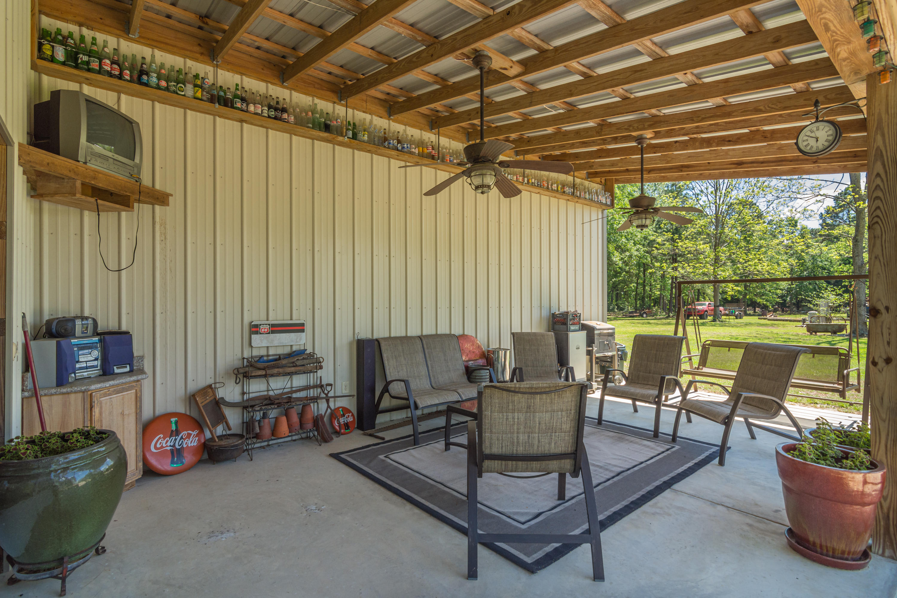 5995 Jack Stokes Road Baker, FL 32531 - Photo 18 of 60 a view of a livingroom with furniture and a grill