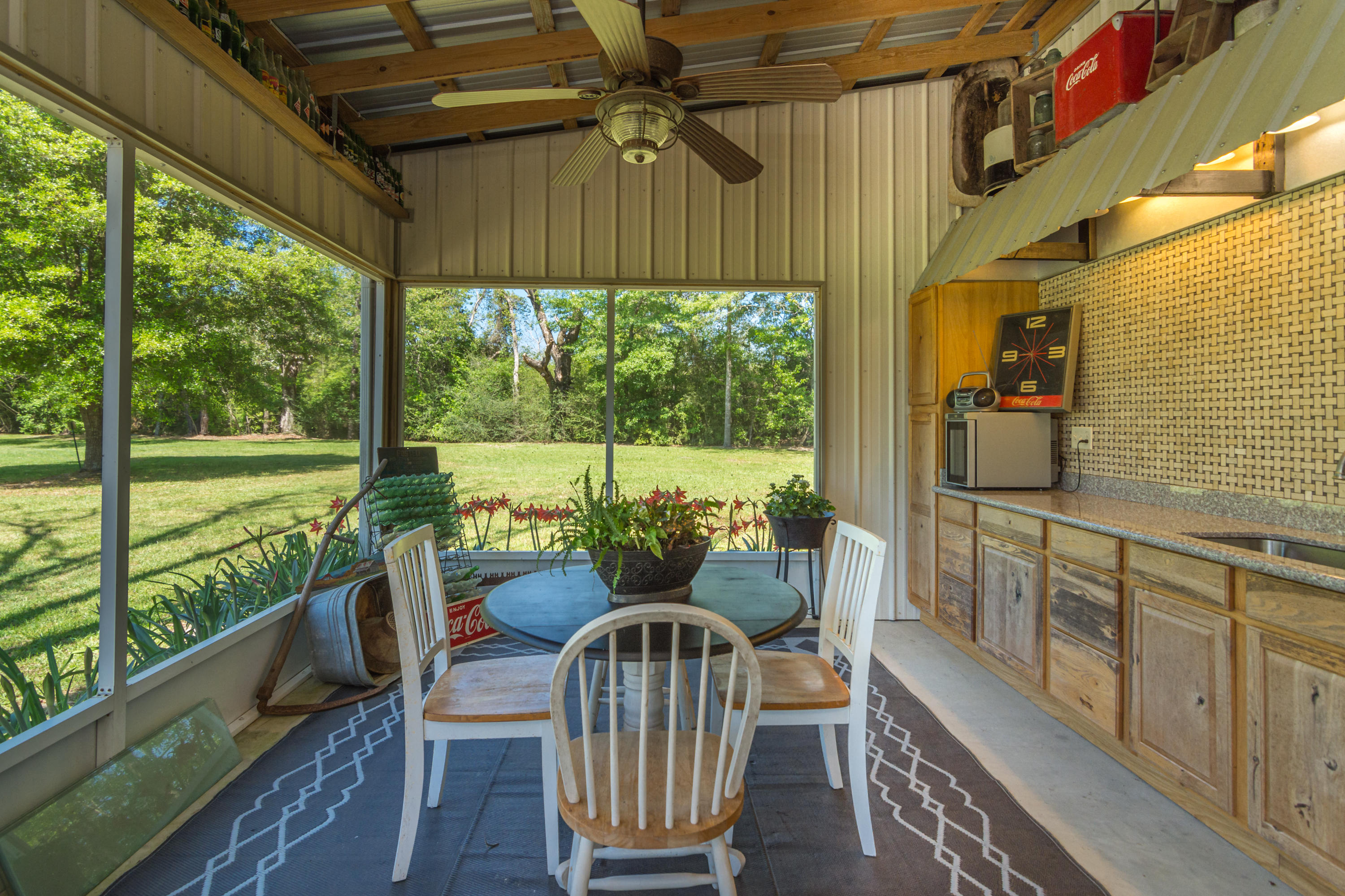 5995 Jack Stokes Road Baker, FL 32531 - Photo 20 of 60 a view of a two chairs in the balcony