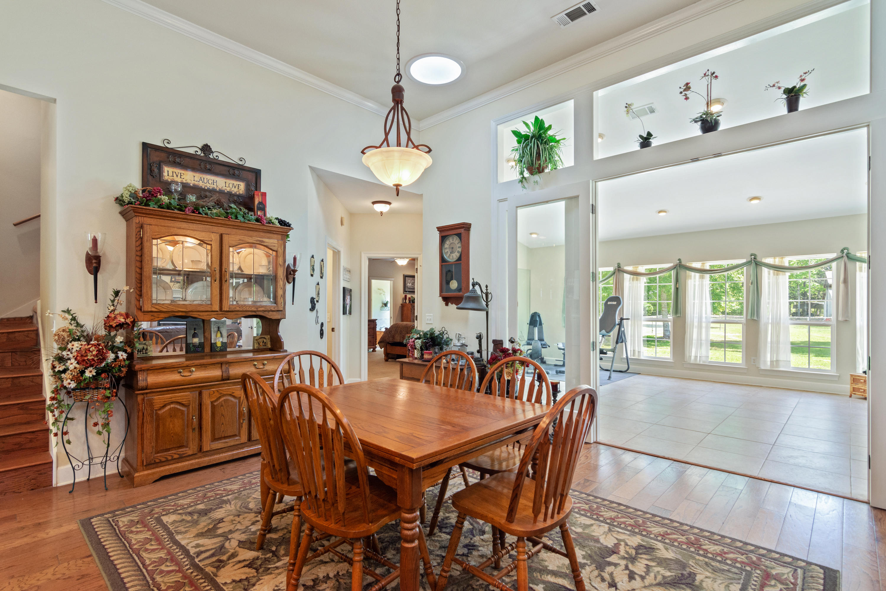 5995 Jack Stokes Road Baker, FL 32531 - Photo 27 of 60 a view of a dining room with furniture window and outside view