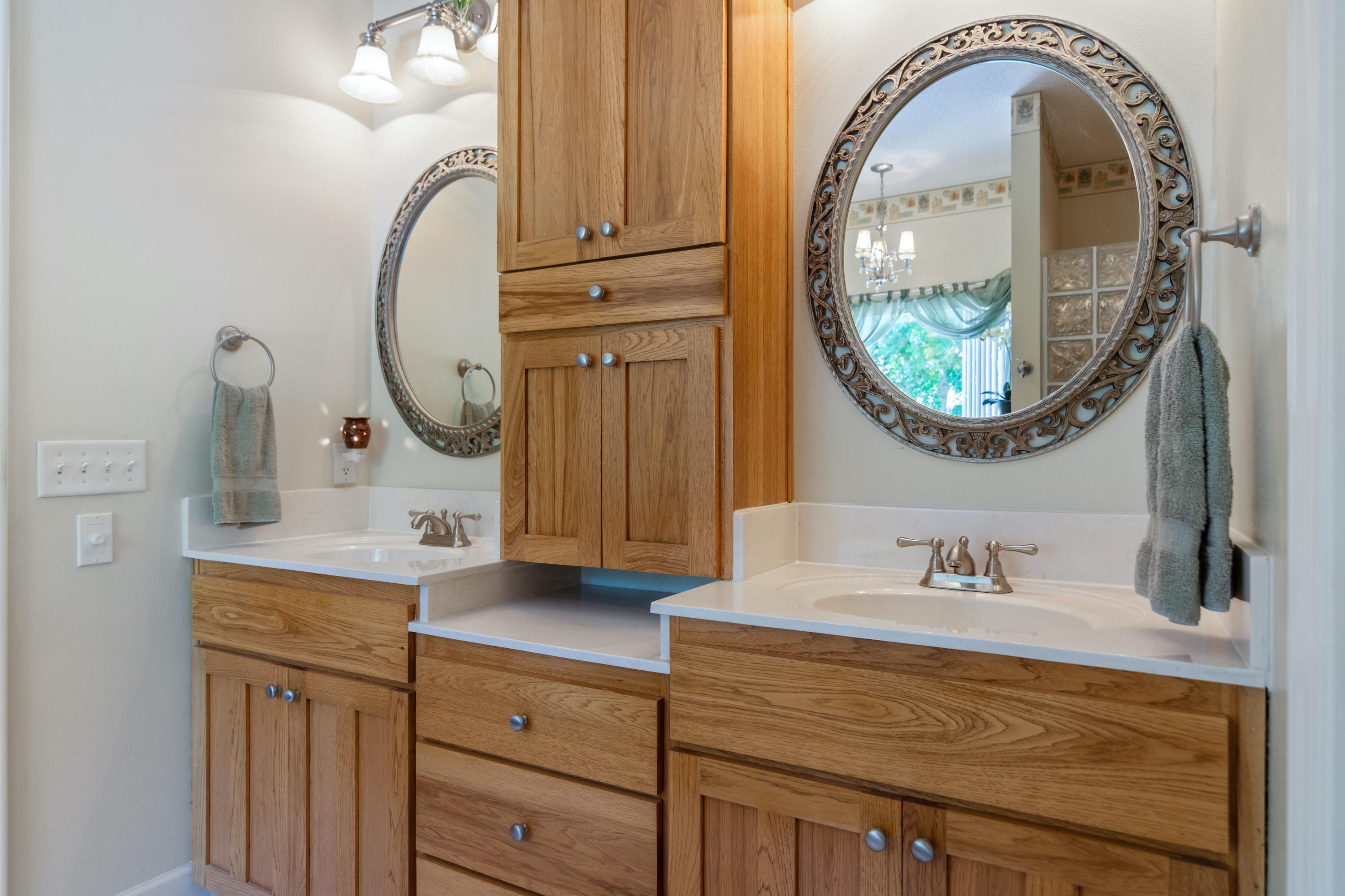 5995 Jack Stokes Road Baker, FL 32531 - Photo 42 of 60 a bathroom with a sink and a mirror