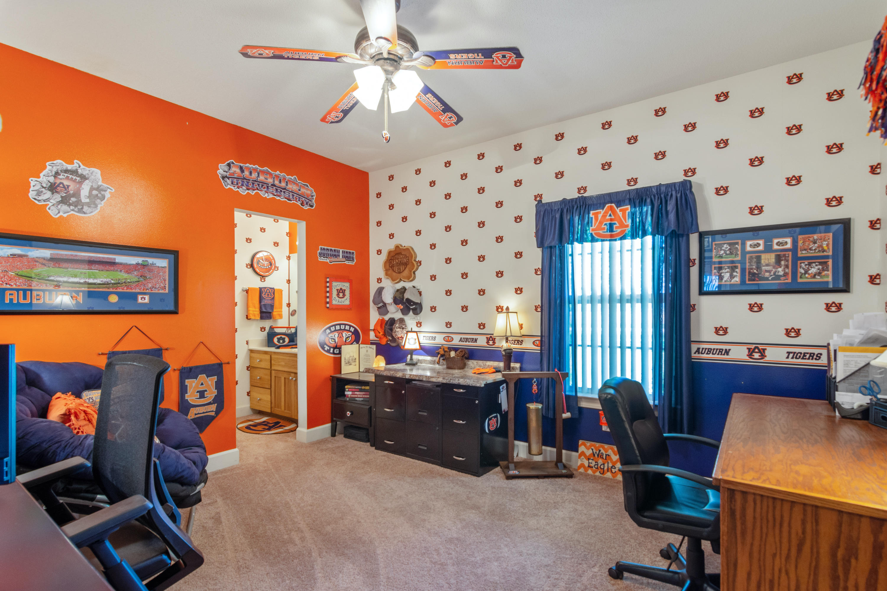 5995 Jack Stokes Road Baker, FL 32531 - Photo 44 of 60 a view of a workspace with furniture and a window