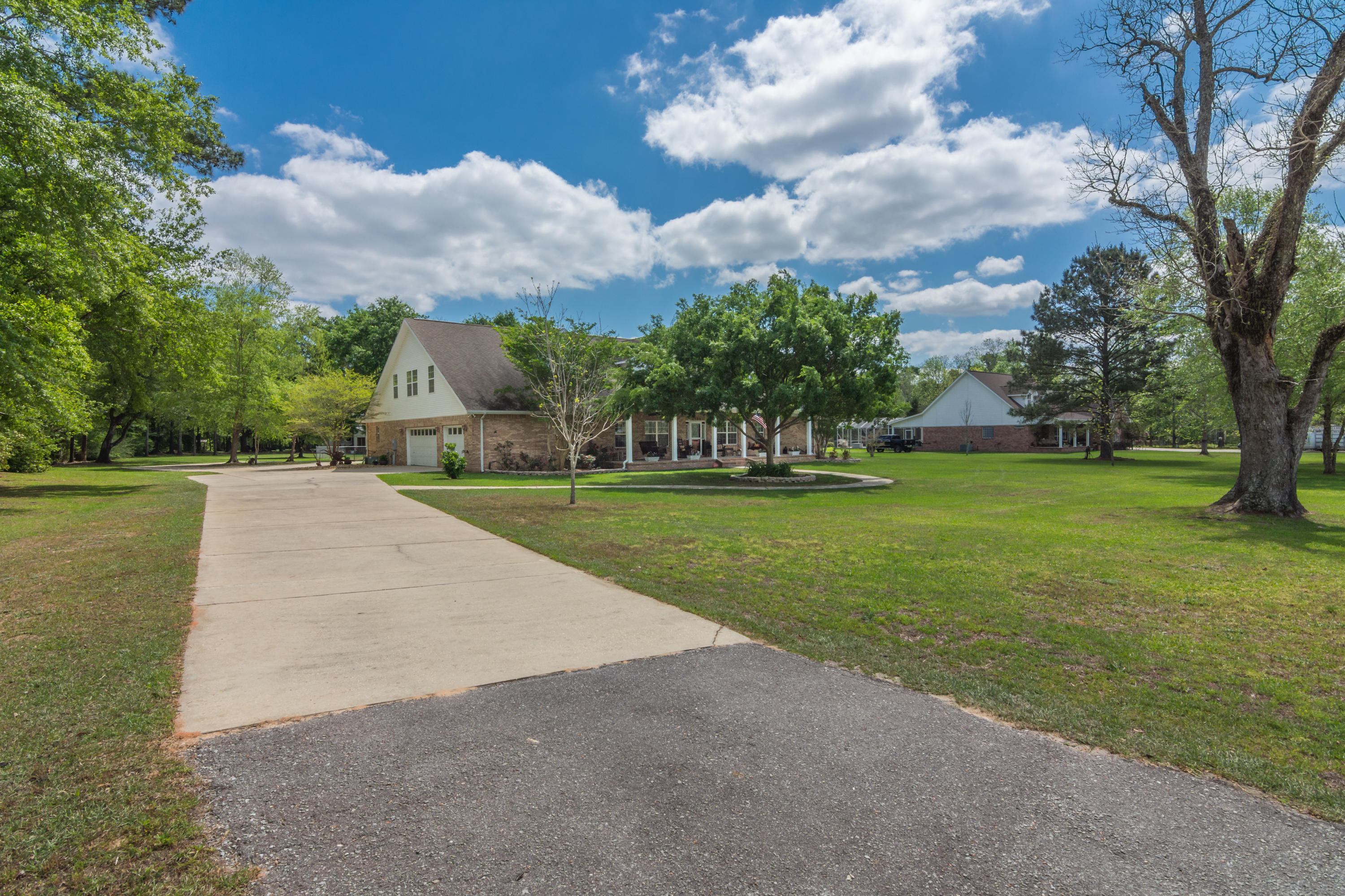 5995 Jack Stokes Road Baker, FL 32531 - Photo 7 of 60 a view of building with outdoor space