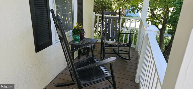 a view of stairs and wooden floor